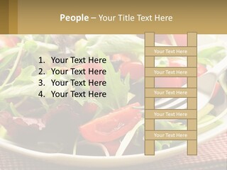 A Salad With Tomatoes And Lettuce On A Plate With A Fork PowerPoint Template