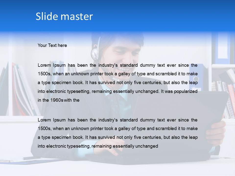 A Man Wearing A Headset And Using A Laptop PowerPoint Template