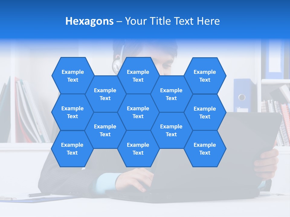 A Man Wearing A Headset And Using A Laptop PowerPoint Template