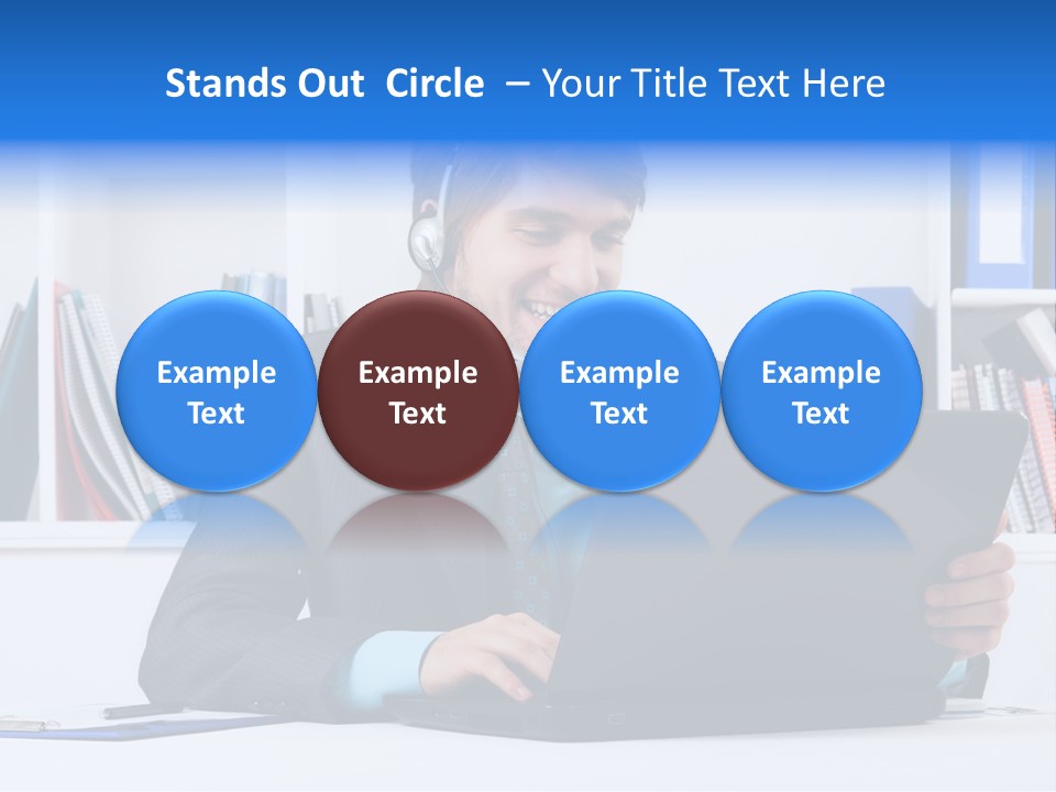 A Man Wearing A Headset And Using A Laptop PowerPoint Template