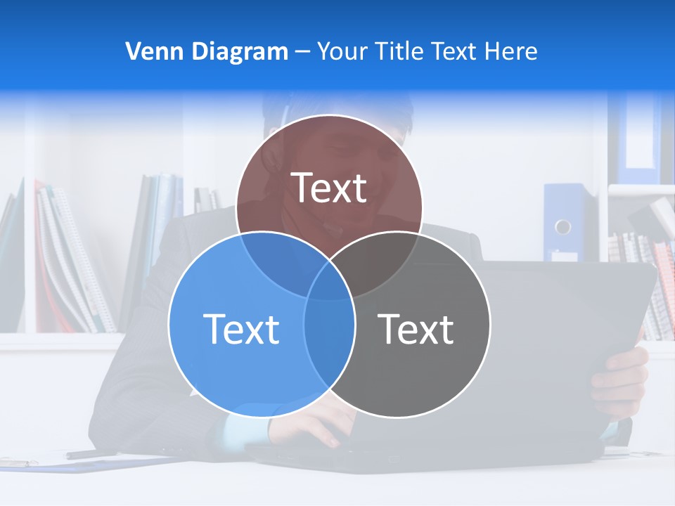 A Man Wearing A Headset And Using A Laptop PowerPoint Template