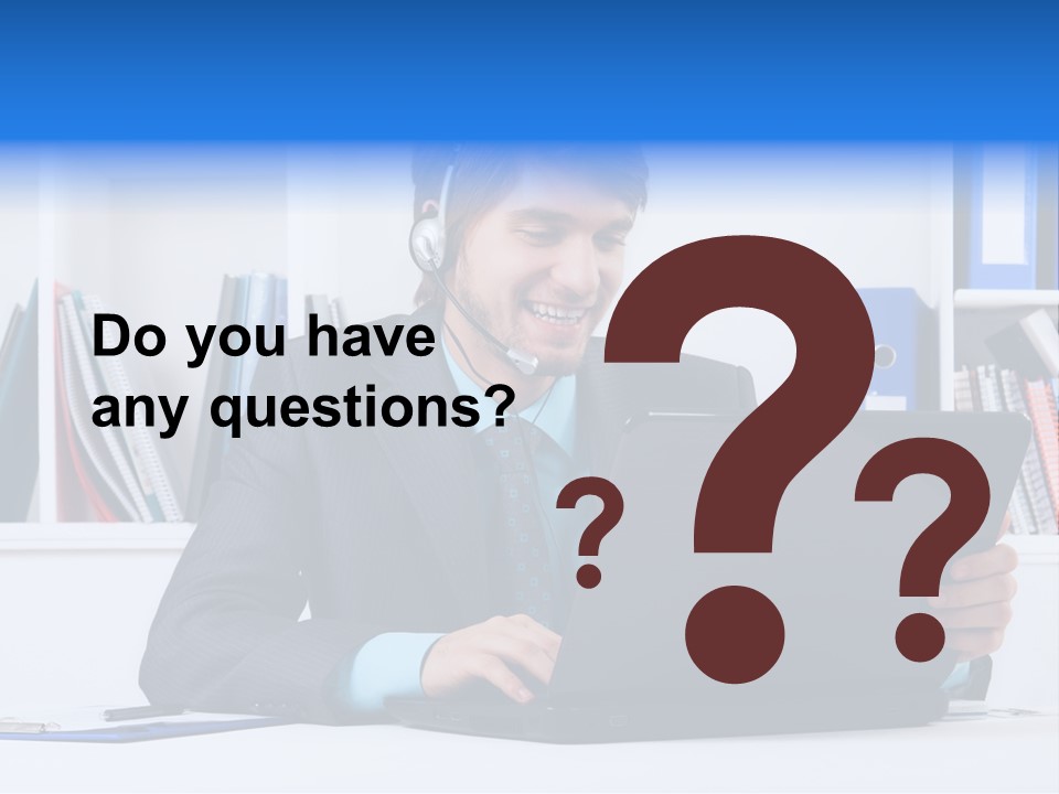 A Man Wearing A Headset And Using A Laptop PowerPoint Template