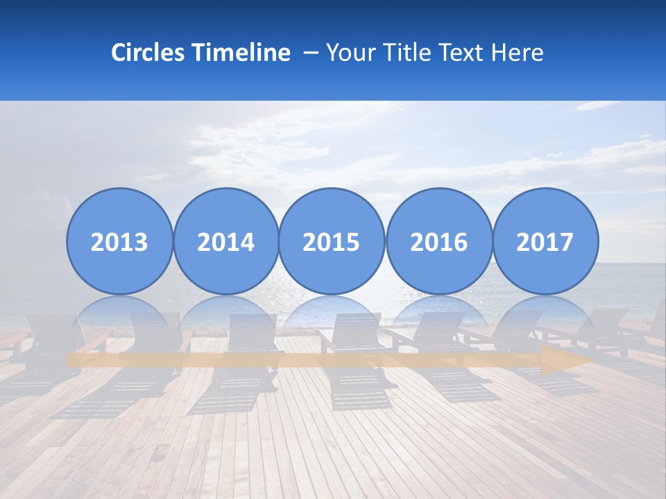 A Group Of Lounge Chairs Sitting On Top Of A Wooden Pier PowerPoint Template