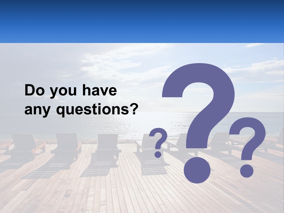 A Group Of Lounge Chairs Sitting On Top Of A Wooden Pier PowerPoint Template