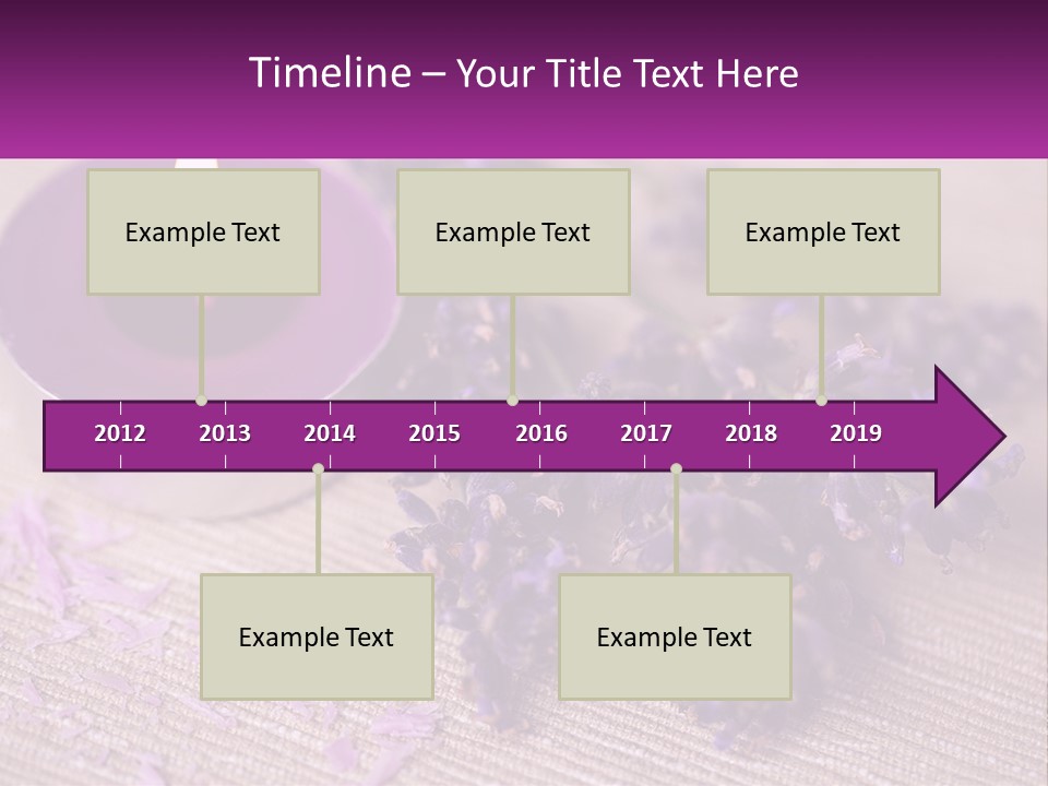 A Purple Candle And Some Lavender Flowers On A Table PowerPoint Template