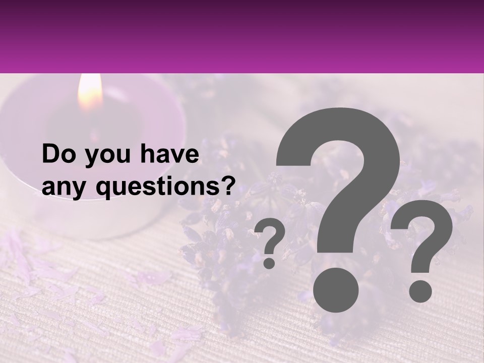 A Purple Candle And Some Lavender Flowers On A Table PowerPoint Template