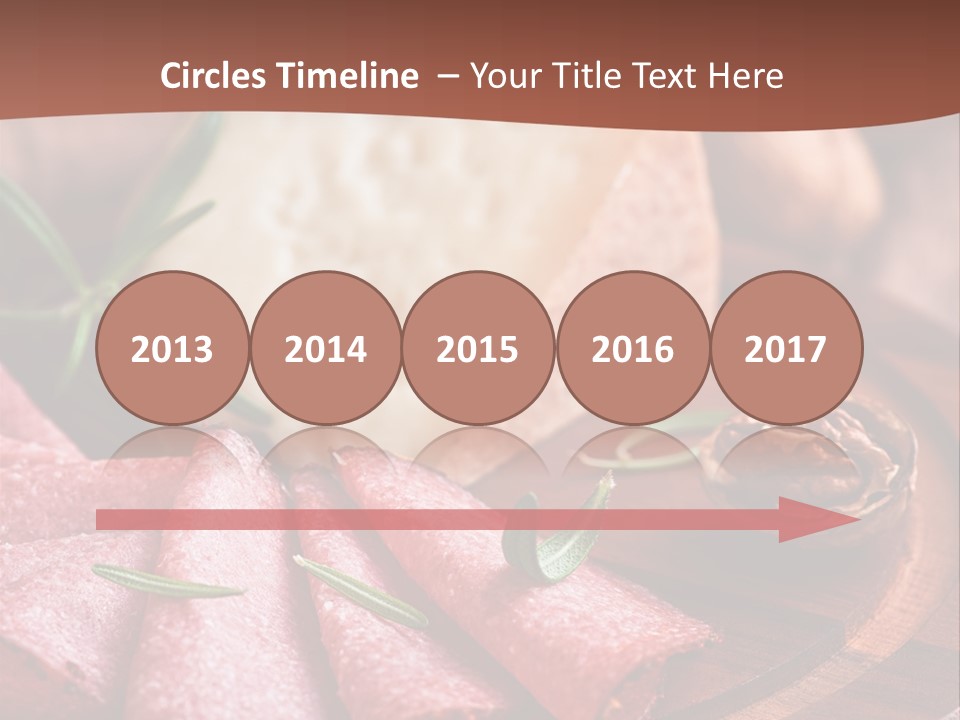 A Wooden Plate With Cheese And Nuts On It PowerPoint Template