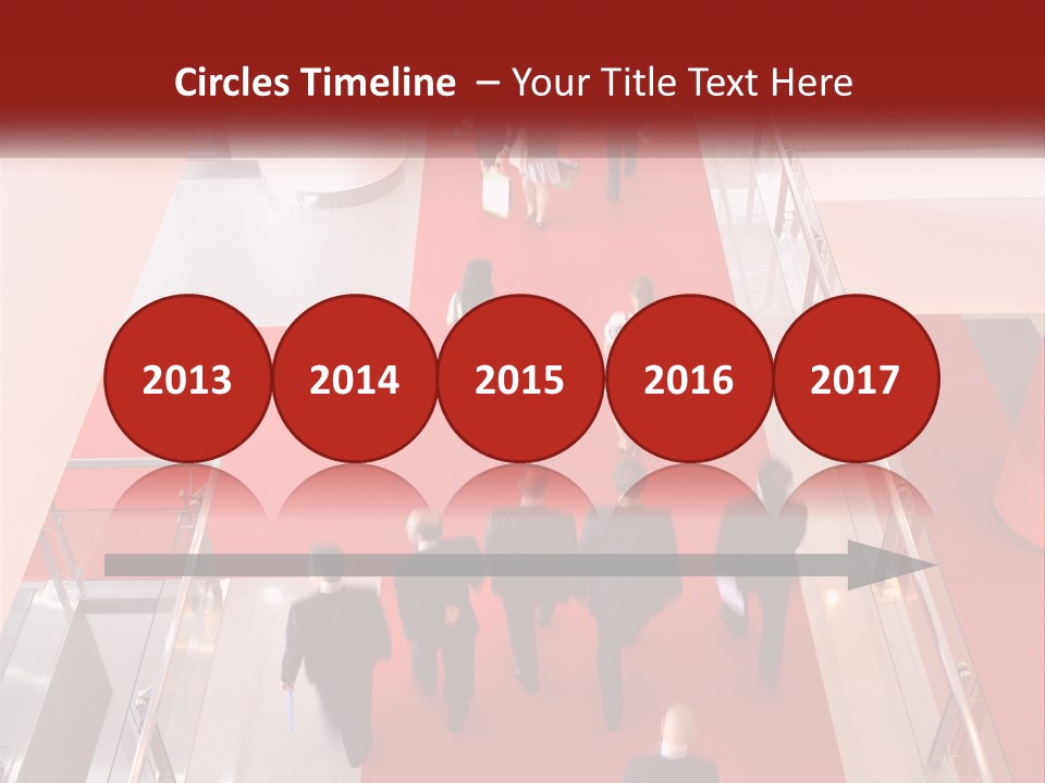 A Group Of People Walking Down A Red Carpeted Hallway PowerPoint Template