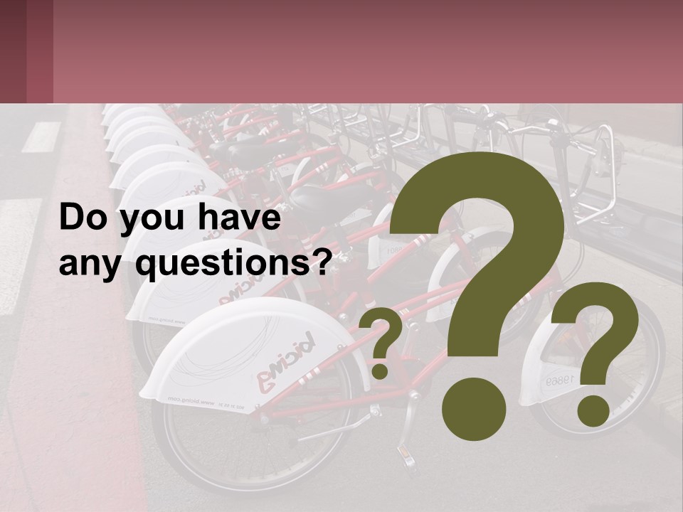 A Row Of Bikes Parked Next To Each Other PowerPoint Template