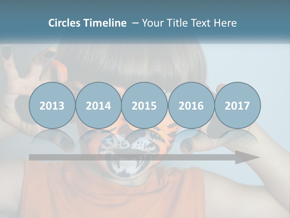 A Young Boy With A Tiger Face Painted On His Face PowerPoint Template