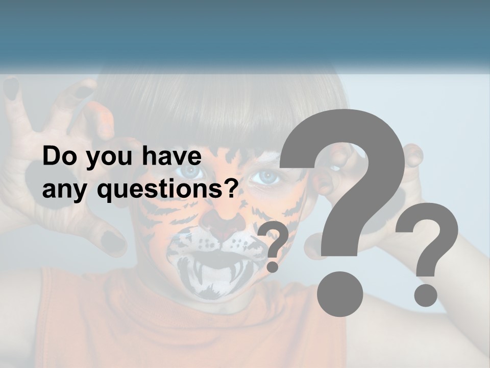 A Young Boy With A Tiger Face Painted On His Face PowerPoint Template
