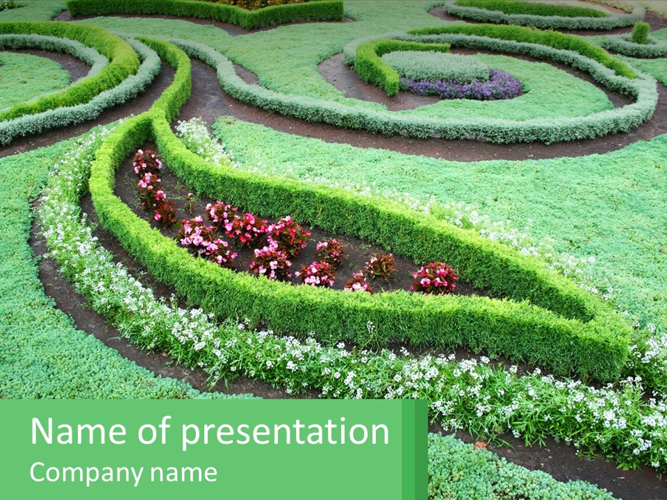 A Green Garden With A Spiral Design In The Center PowerPoint Template