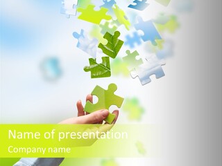 A Person Holding A Piece Of A Puzzle PowerPoint Template