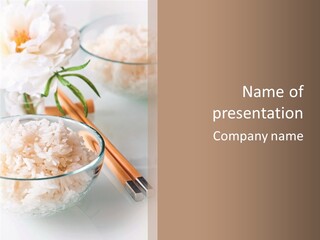 A Bowl Of Rice And Chopsticks On A Table PowerPoint Template