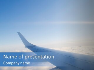 The Wing Of An Airplane Flying Above The Clouds PowerPoint Template