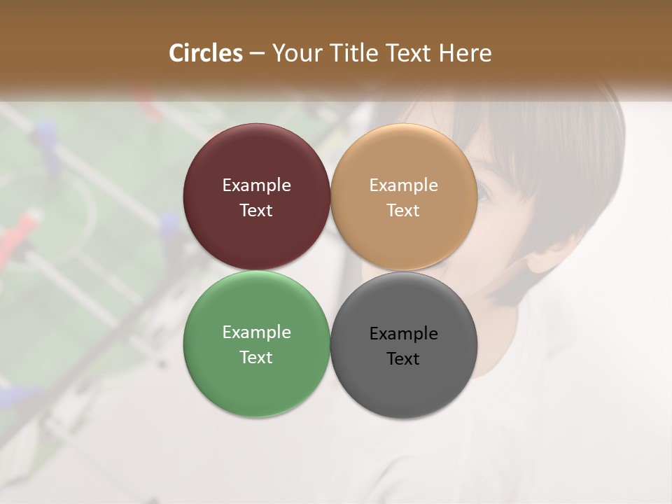 A Young Boy Standing In Front Of A Soccer Field PowerPoint Template