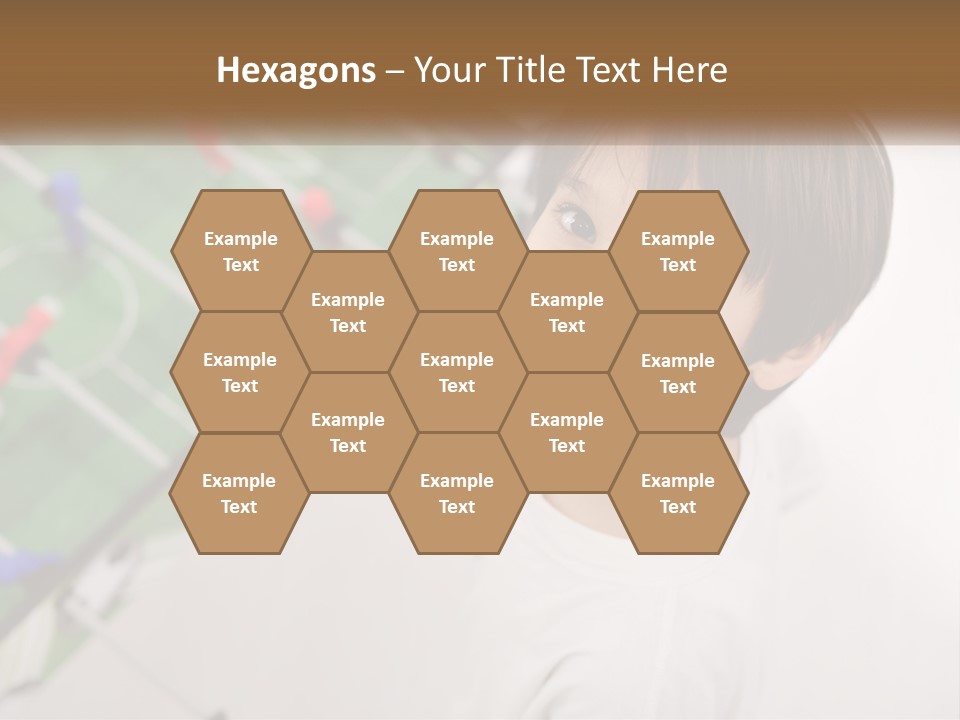 A Young Boy Standing In Front Of A Soccer Field PowerPoint Template