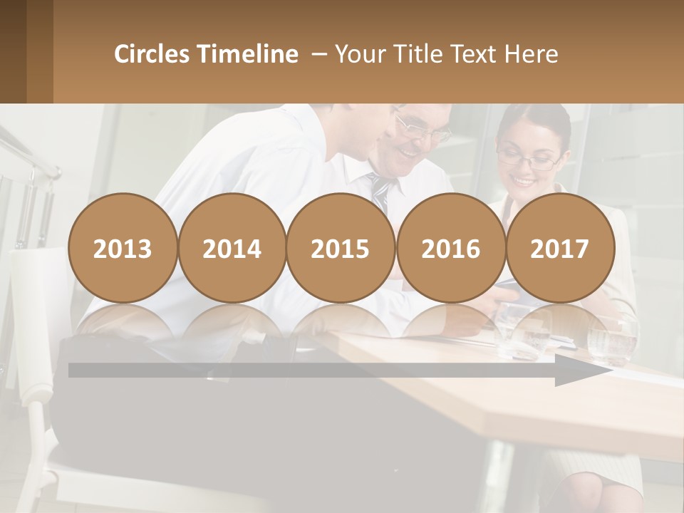 A Man And Woman Sitting At A Table With A Tablet PowerPoint Template