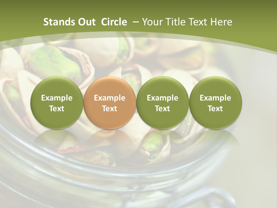 A Glass Jar Filled With Pistachios On Top Of A Table PowerPoint Template