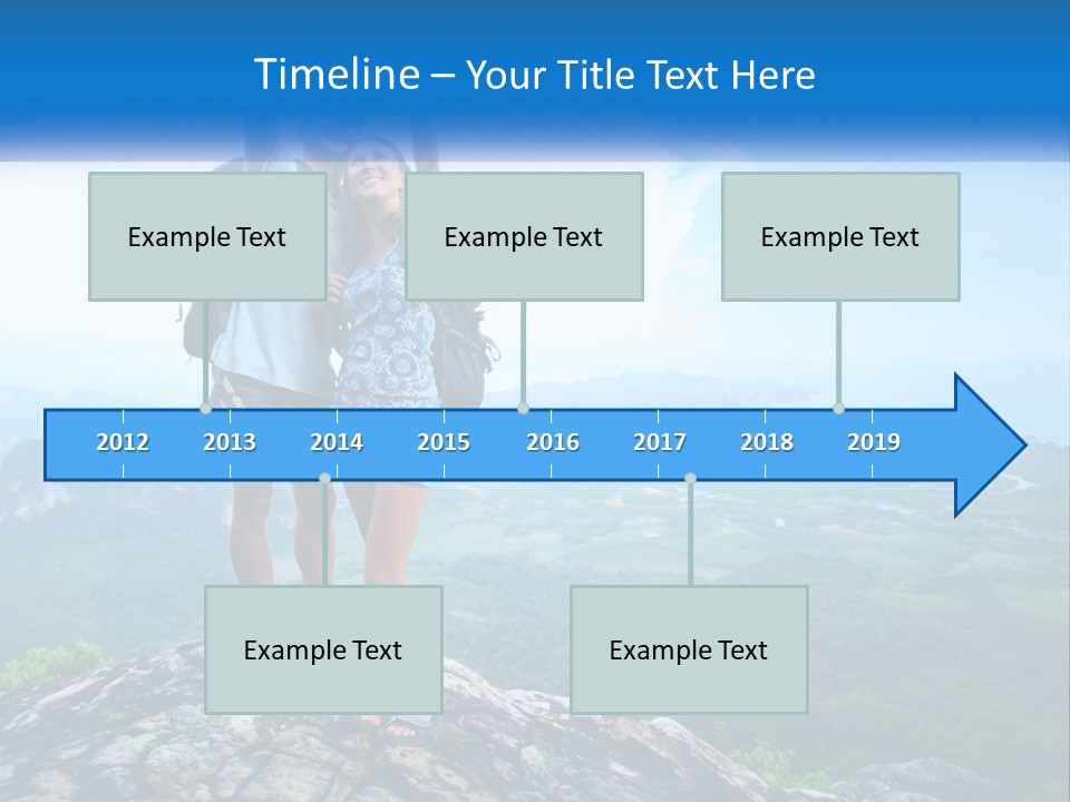 A Couple Of People Standing On Top Of A Mountain PowerPoint Template