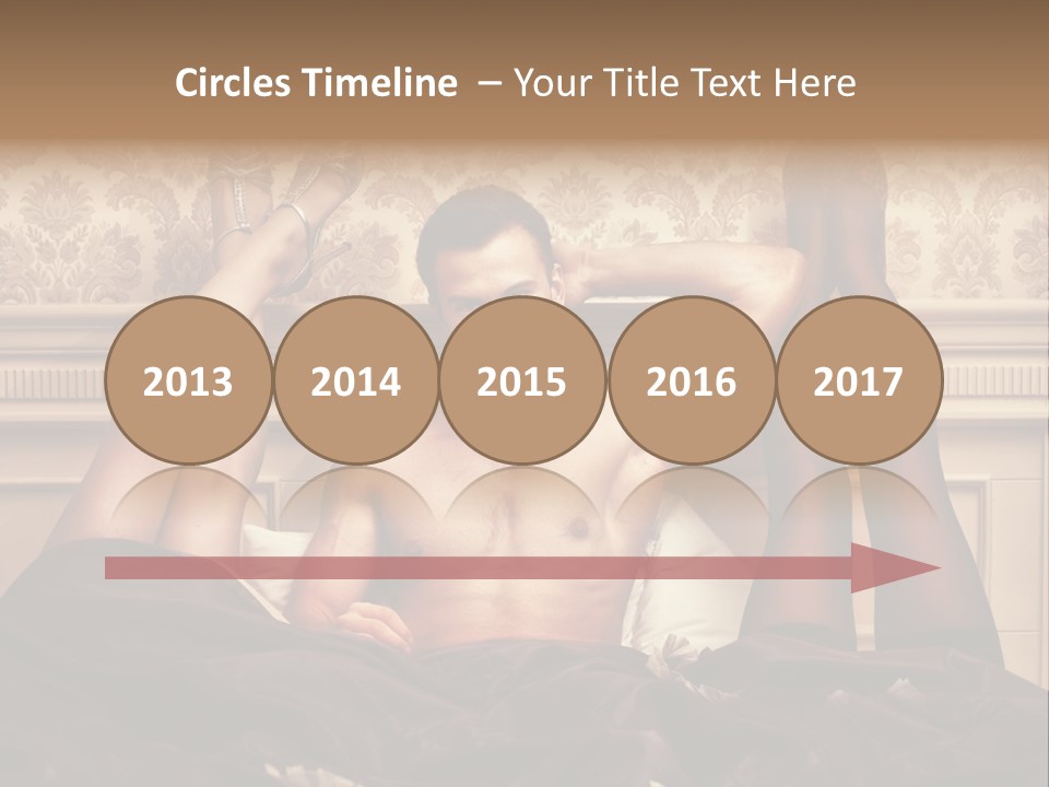 A Man Laying On Top Of A Bed Next To A Woman PowerPoint Template