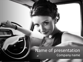 A Woman Sitting In A Car With Her Hand On The Steering Wheel PowerPoint Template