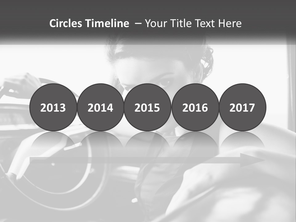 A Woman Sitting In A Car With Her Hand On The Steering Wheel PowerPoint Template