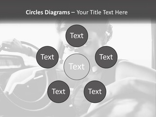 A Woman Sitting In A Car With Her Hand On The Steering Wheel PowerPoint Template