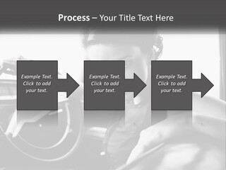 A Woman Sitting In A Car With Her Hand On The Steering Wheel PowerPoint Template