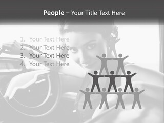 A Woman Sitting In A Car With Her Hand On The Steering Wheel PowerPoint Template