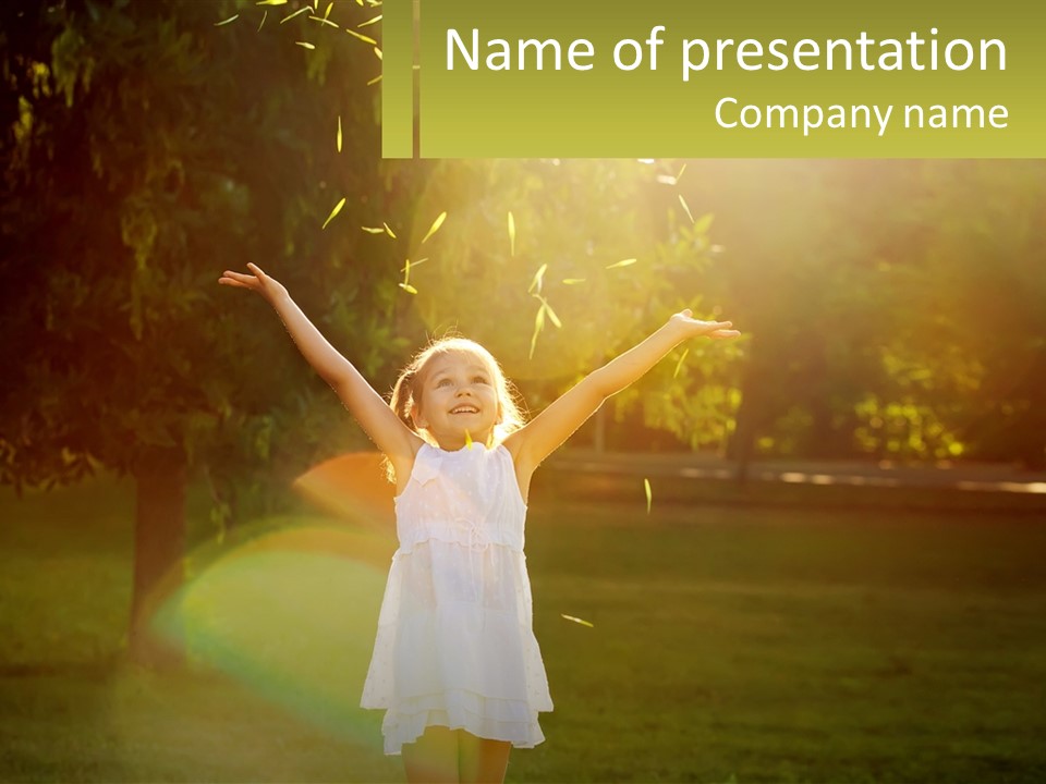 A Little Girl Is Standing In The Grass With Her Arms Outstretched PowerPoint Template