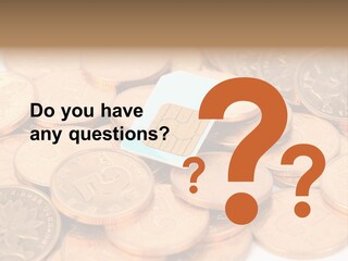 A Small Sim Card Sitting On Top Of A Pile Of Coins PowerPoint Template