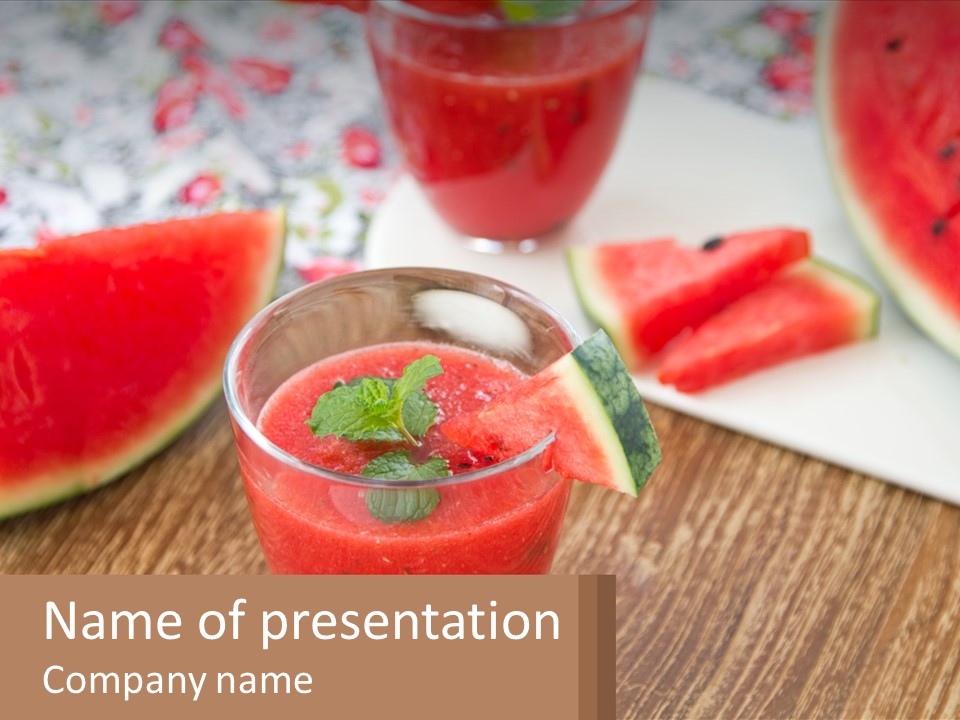 A Glass Of Watermelon Juice On A Table With Slices Of Watermelon PowerPoint Template