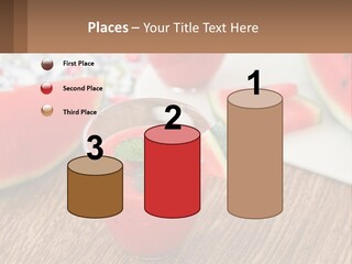 A Glass Of Watermelon Juice On A Table With Slices Of Watermelon PowerPoint Template