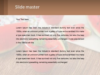 A Glass Of Watermelon Juice On A Table With Slices Of Watermelon PowerPoint Template
