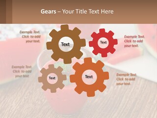 A Glass Of Watermelon Juice On A Table With Slices Of Watermelon PowerPoint Template