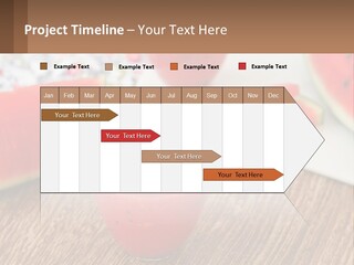 A Glass Of Watermelon Juice On A Table With Slices Of Watermelon PowerPoint Template