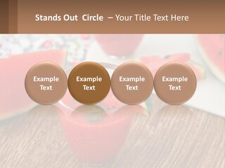 A Glass Of Watermelon Juice On A Table With Slices Of Watermelon PowerPoint Template