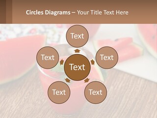 A Glass Of Watermelon Juice On A Table With Slices Of Watermelon PowerPoint Template