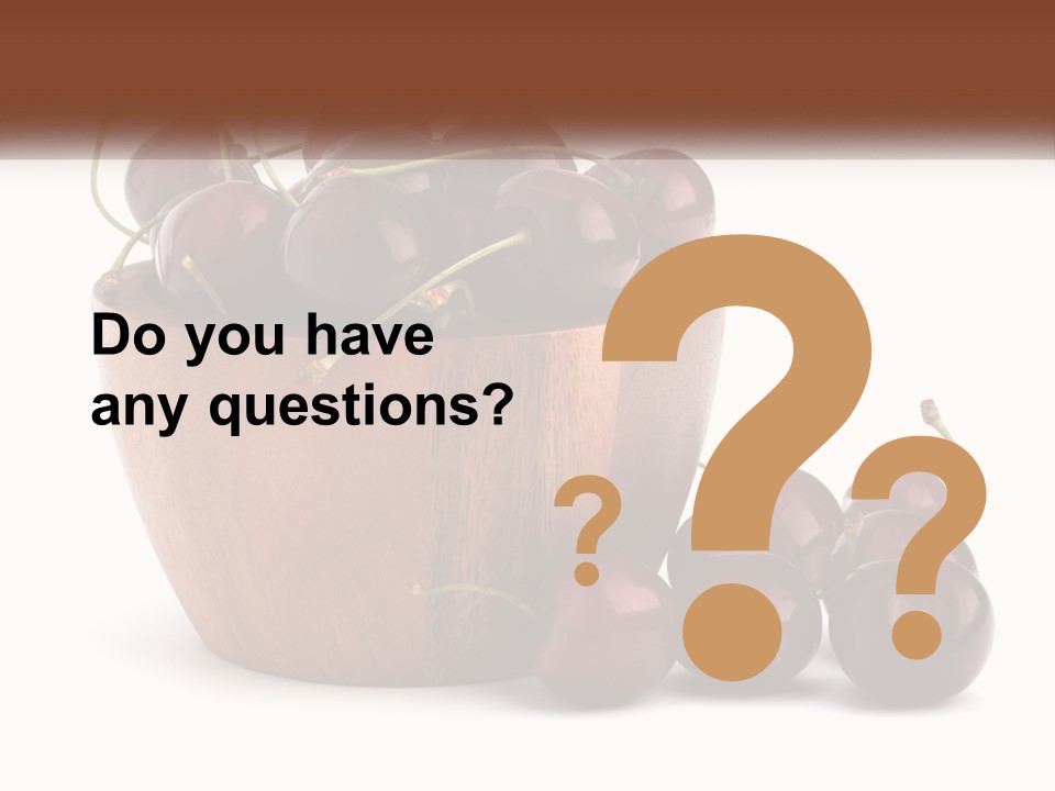 A Wooden Bowl Filled With Cherries On Top Of A Table PowerPoint Template