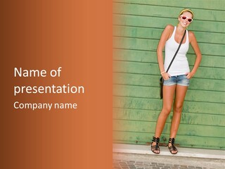 A Woman Standing In Front Of A Green Wall PowerPoint Template