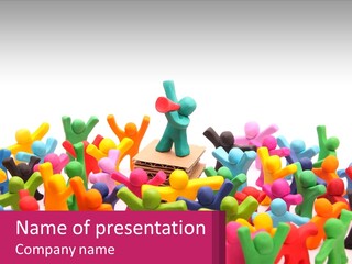 A Large Group Of Colorful Toy Figures In A Pile PowerPoint Template