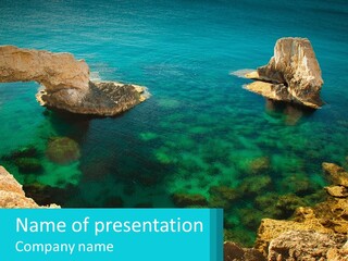 A Large Body Of Water Surrounded By Rocks PowerPoint Template