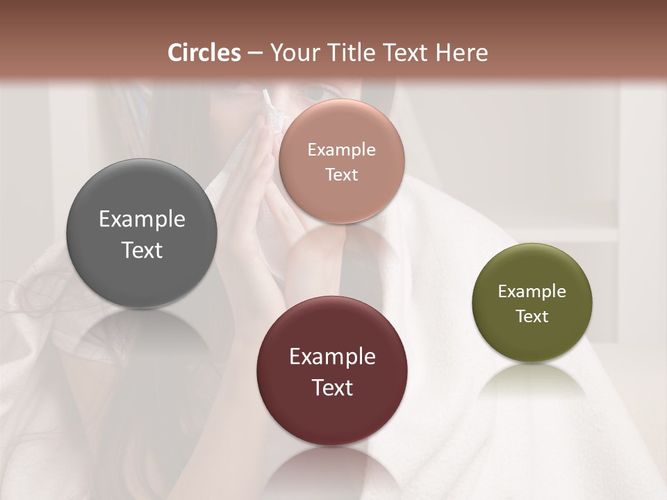 A Woman Wrapped In A Blanket Is Sitting On A Couch PowerPoint Template