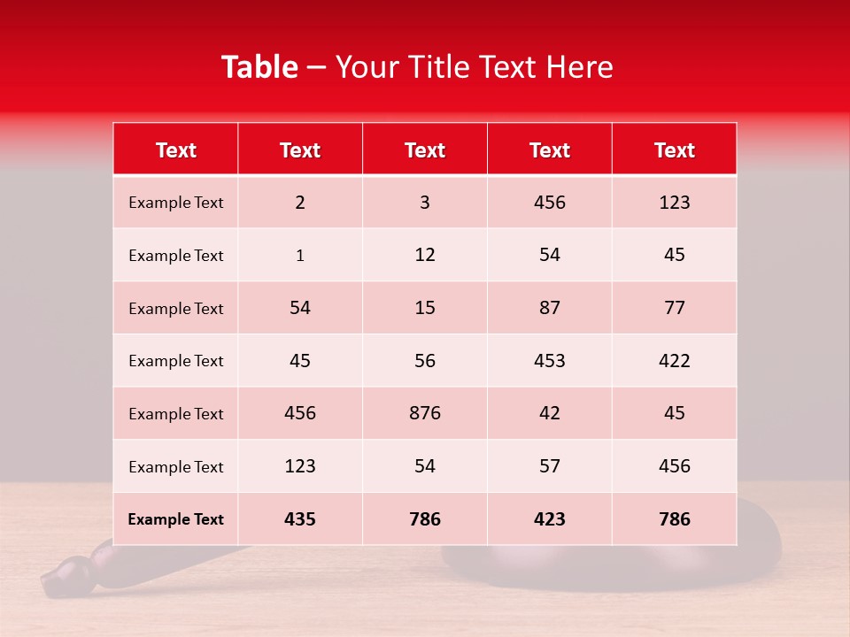 A Judge's Gaven Sitting On Top Of A Wooden Table PowerPoint Template