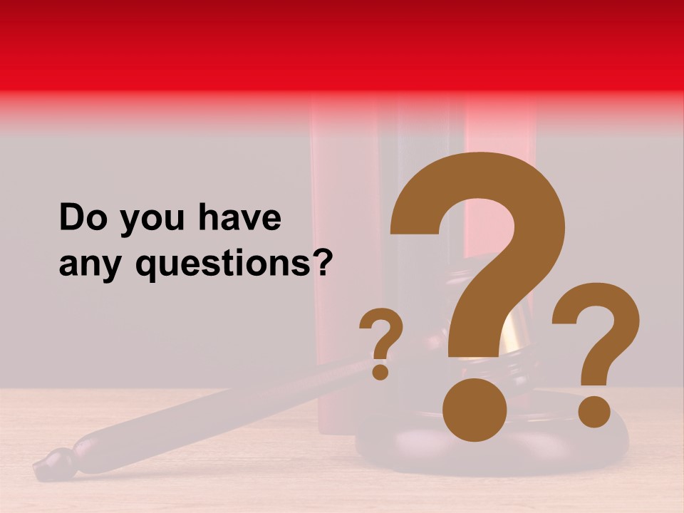 A Judge's Gaven Sitting On Top Of A Wooden Table PowerPoint Template