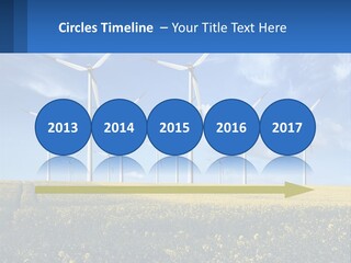 A Bunch Of Windmills In A Field Of Yellow Flowers PowerPoint Template