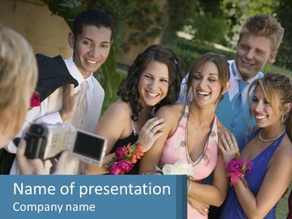 A Group Of People Taking A Picture With A Camera PowerPoint Template