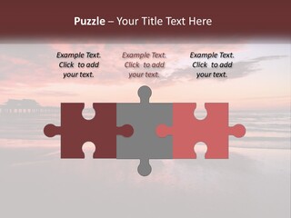 A Sunset Over The Ocean With A Pier In The Background PowerPoint Template