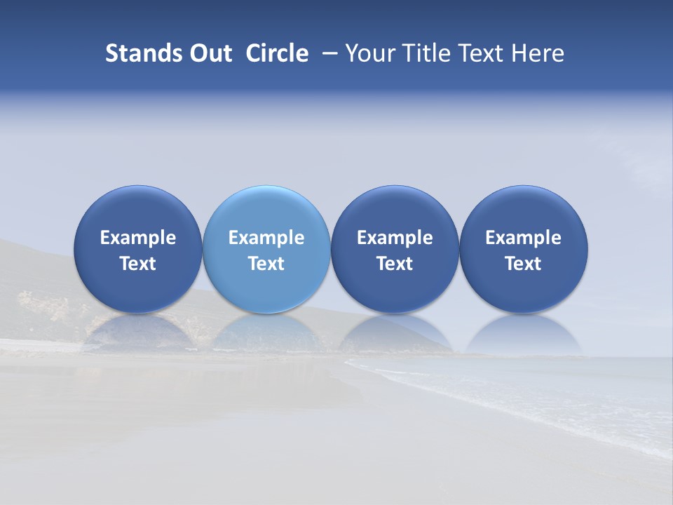 A Sandy Beach With A Hill In The Background PowerPoint Template